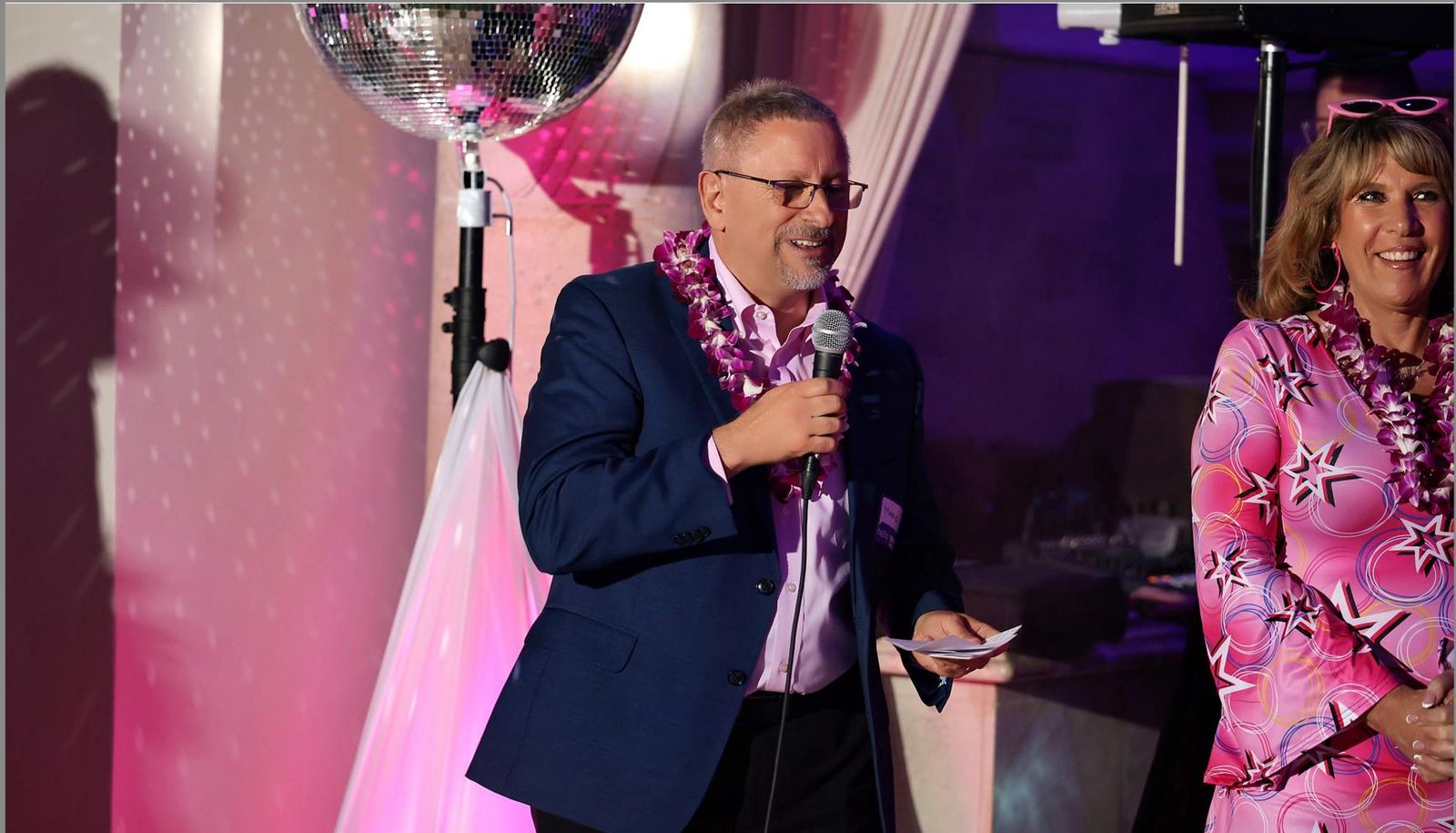 A speaker addressing guests